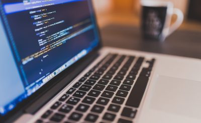 Coding, programming, working — Dr. Andrew Gomes Helping Patients Improve Recovery Through Innovative Neuroimaging Techniques