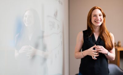 Woman, work, office — Dr. Austin Harris: Mastering Anesthesia Through Innovation and Personalized Care