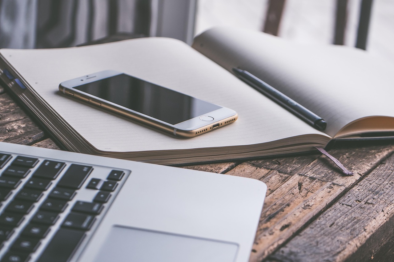 Business, computer, mobile — Strategic Organizational Management: Expert Insights from Thomas Mollick